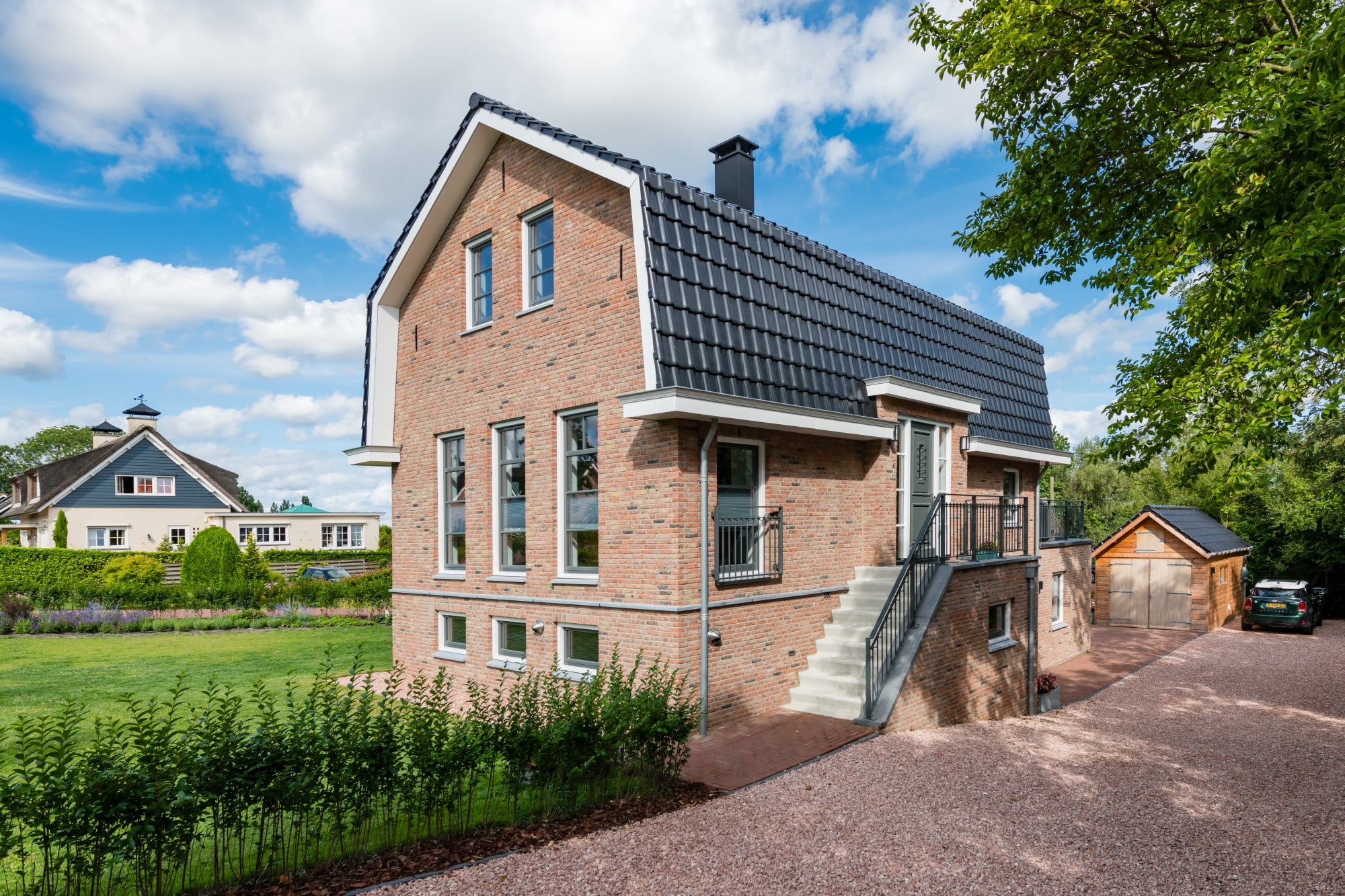 Dijkwoning met mansardekap te Aalsmeer
